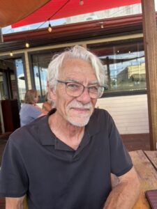 artistic gentleman facing the camera in Jerome, AZ